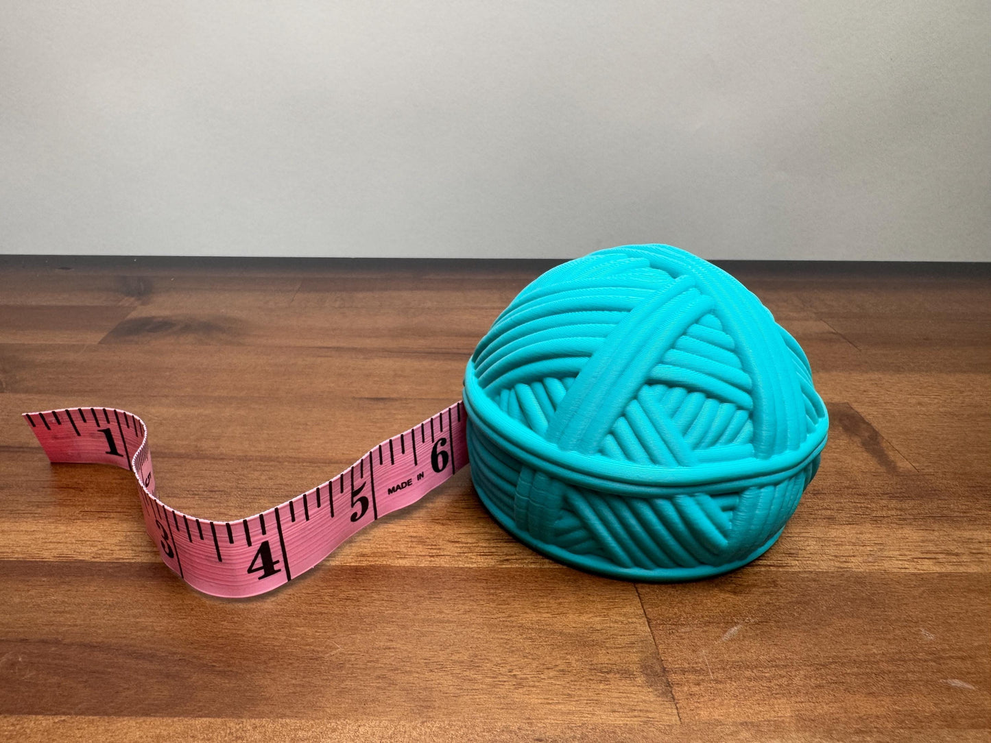 Crochet yarn bowl with cat, stitch counter, measuring tape folder